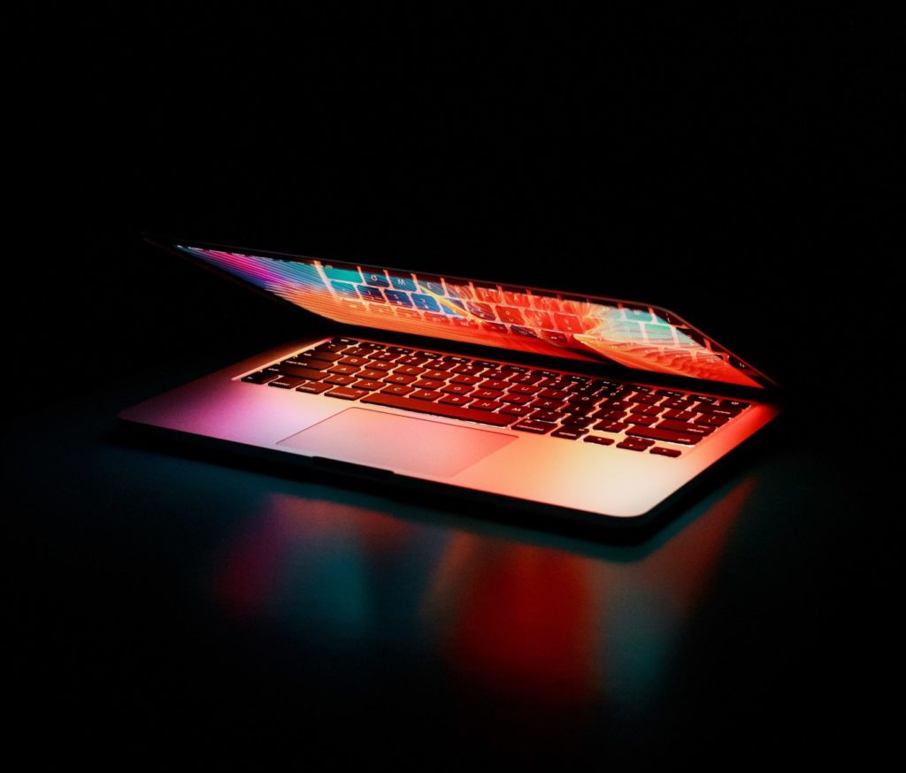 half open laptop glowing